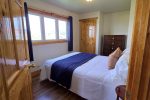 Bedroom with one queen size bed